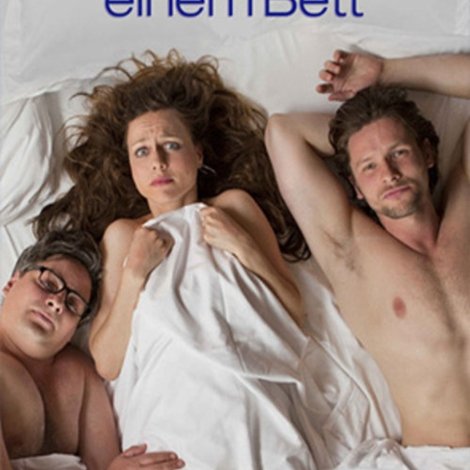 Drei in einem Bett