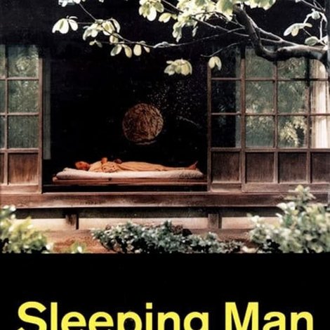 眠る男
