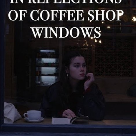 In Reflections of Coffee Shop Windows