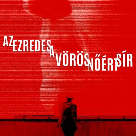 Az ezredes a vörös nőért sír