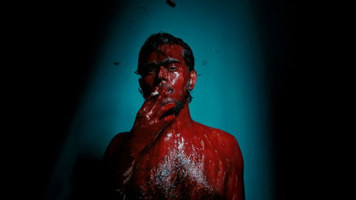 A Fly Floating In The Midst Of The Milk