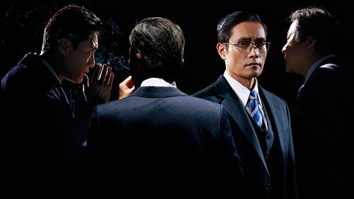 The Man Standing Next