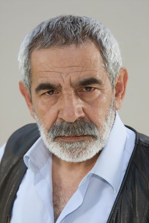 Foto de perfil del actor Turgay Tanülkü en el reparto