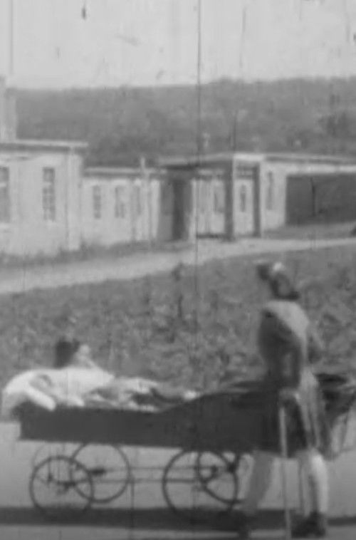 RAIGMORE - STAFF AND PATIENTS, INJURED SERVICEMEN RECEIVE MEDALS