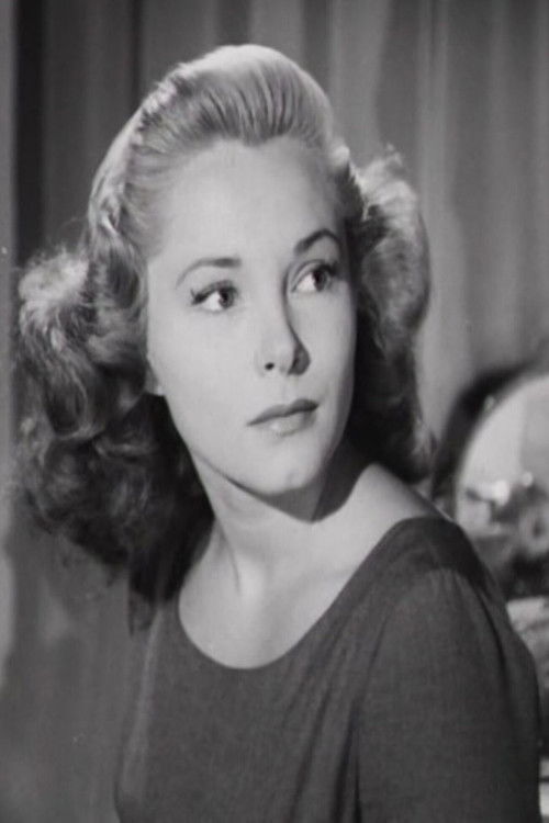 Andrea Bayard interpretando a Louise Dunning / Kitty Herman