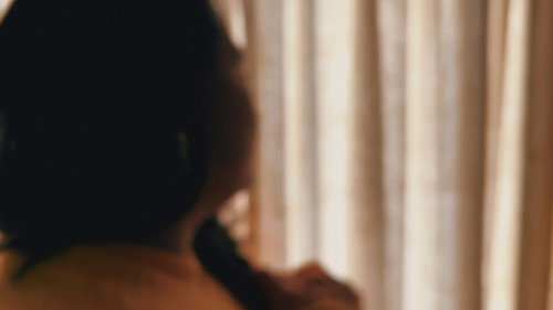 Un Rayo de Luz Backdrop Blur