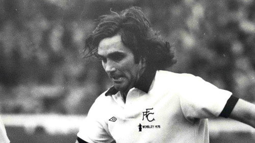 George Best in Cork Backdrop Blur