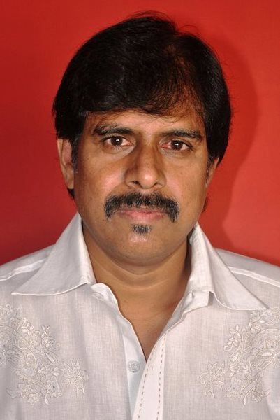 R K Selvamani's poster