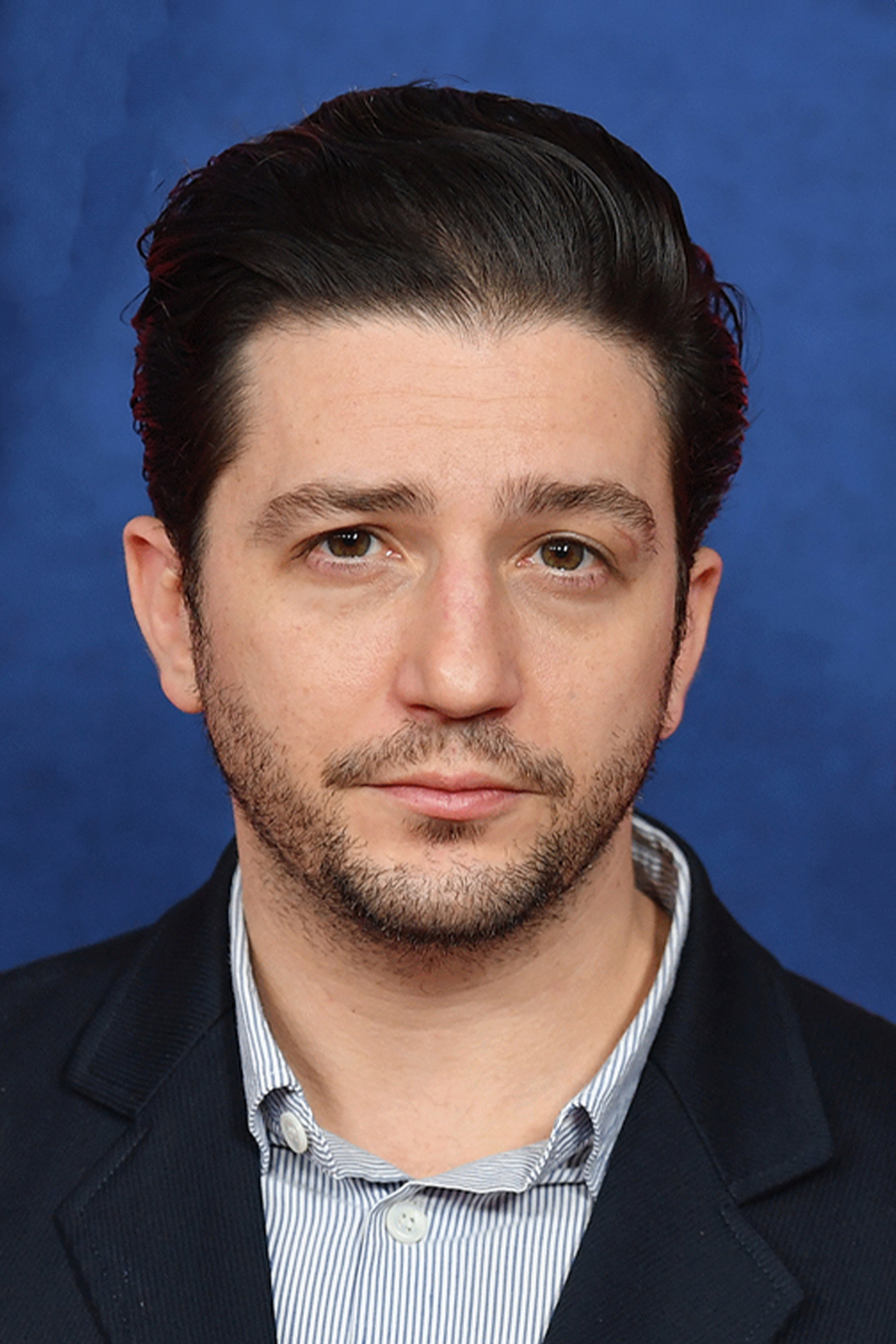 John Magaro's poster