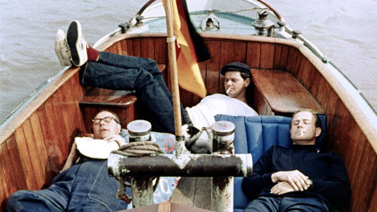 Drei Mann in einem Boot's poster