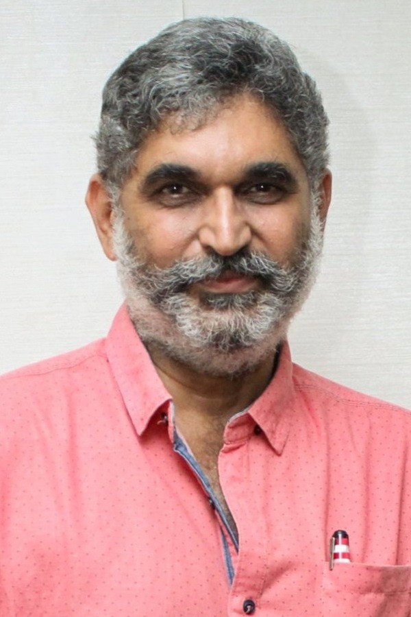 Suresh Chandra Menon's poster
