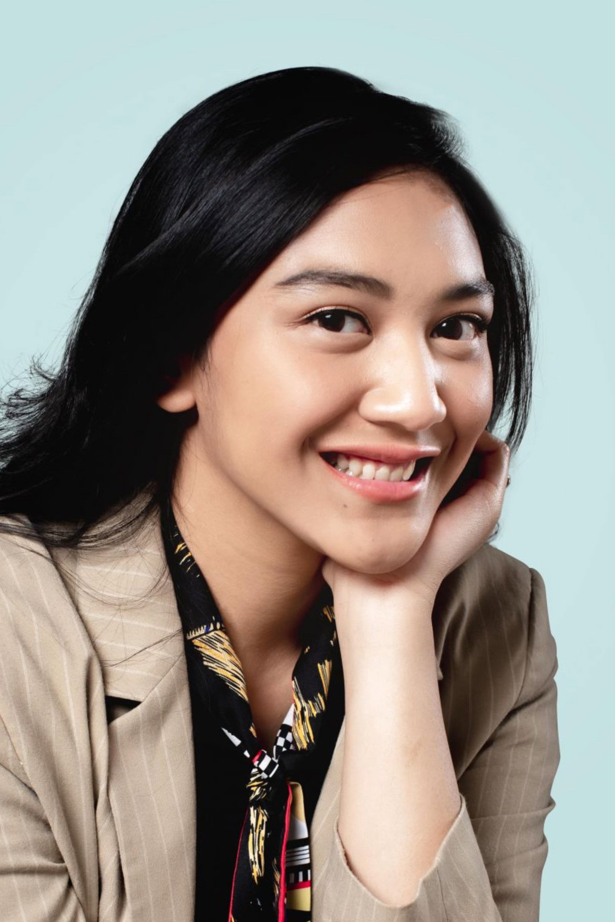 Putri Tanjung's poster