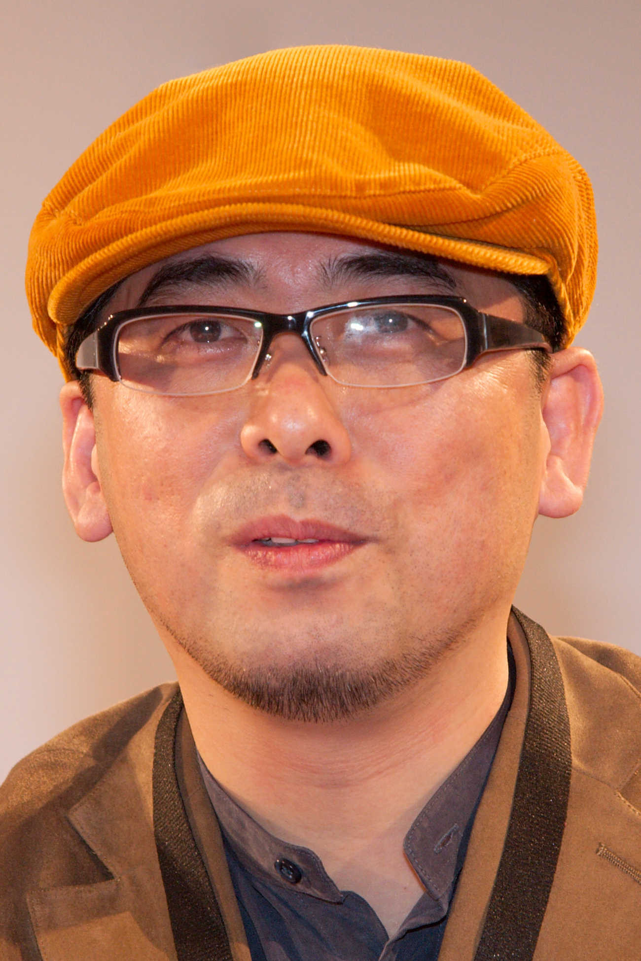 Tensai Okamura's poster