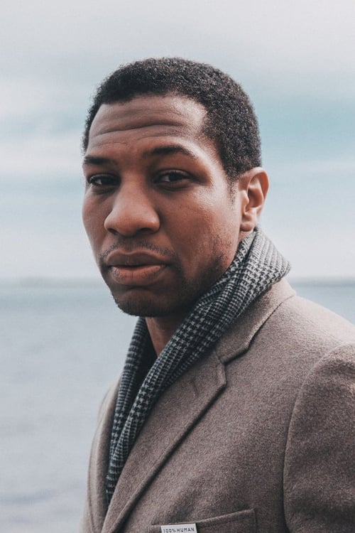 Jonathan Majors isCorporal Henry Woodson