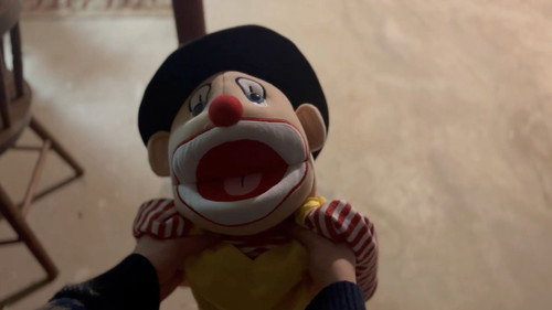 Marionette Nez Rouge Backdrop Blur