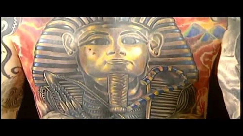 L'Art du tatoo L'histoire du tatouage à travers les ages Backdrop Blur