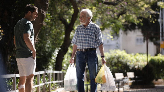 A Man Walks Down the Street