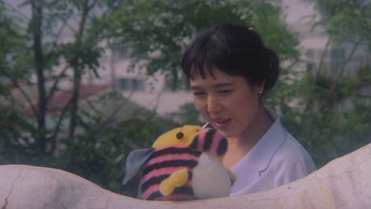 嚙む女