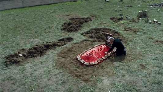 Alça ağacı altındakı məzar
