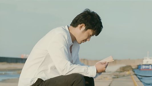 風に濡れた女