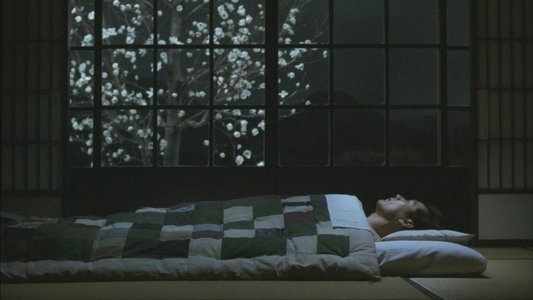 眠る男