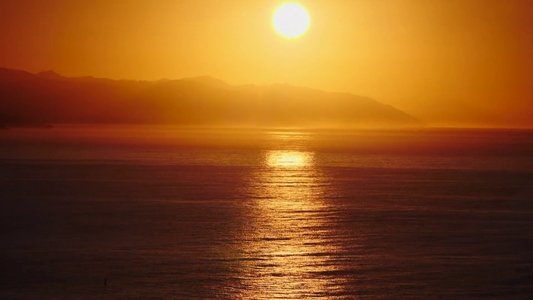 Surfing Morning of the Sun