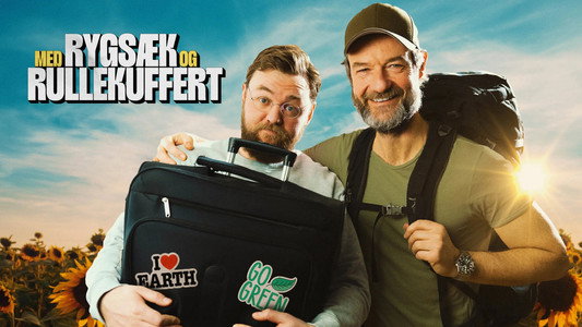 Med rygsæk og rullekuffert