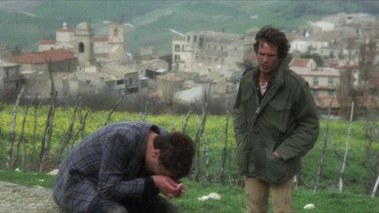 Un uomo in ginocchio