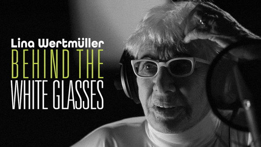 Behind the White Glasses