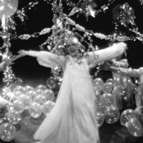 Scarecrow in a Garden of Cucumbers