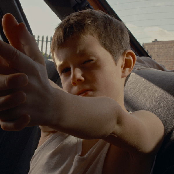 Boy in the Back Seat