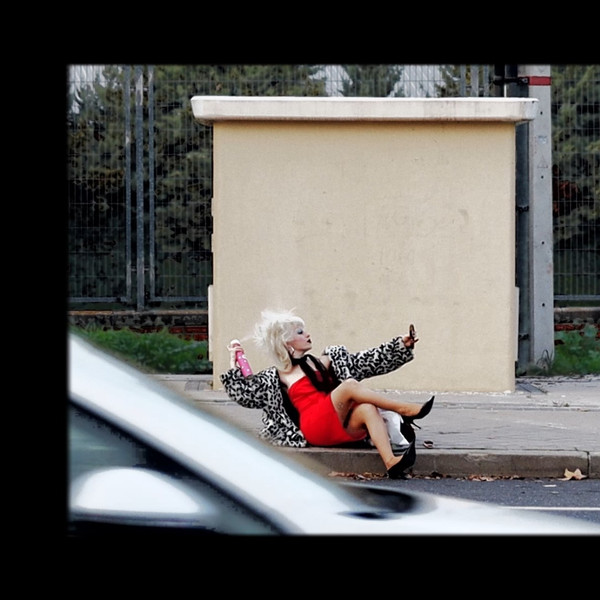 Miss Rimbombanzia doing her makeup in Avenida de los Poblados, 173