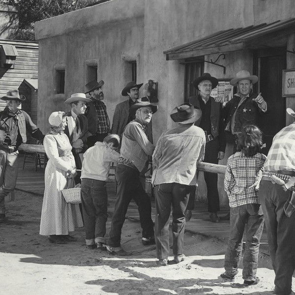 Two Guns and a Badge