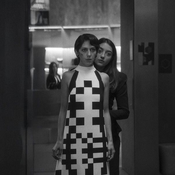 Two People Exchanging Saliva