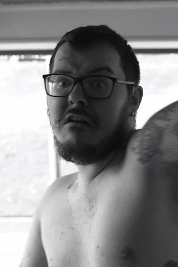 Naked Man With A Hammer