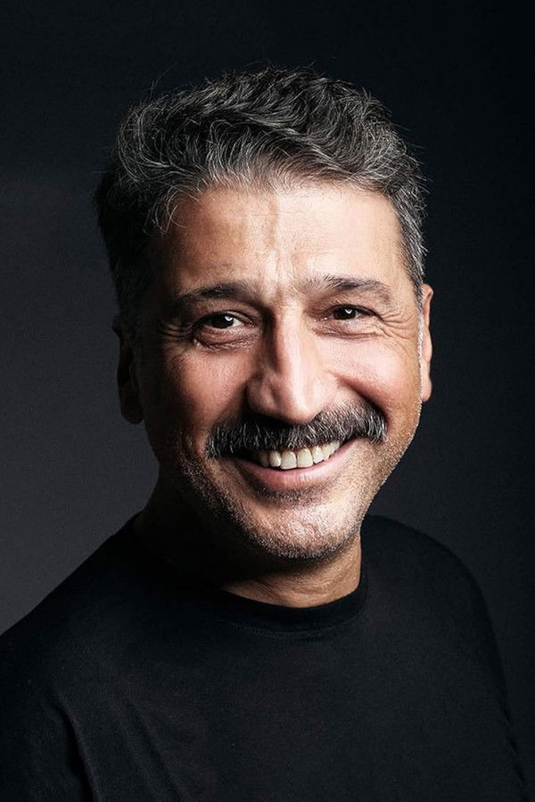 Cem Davran's headshot