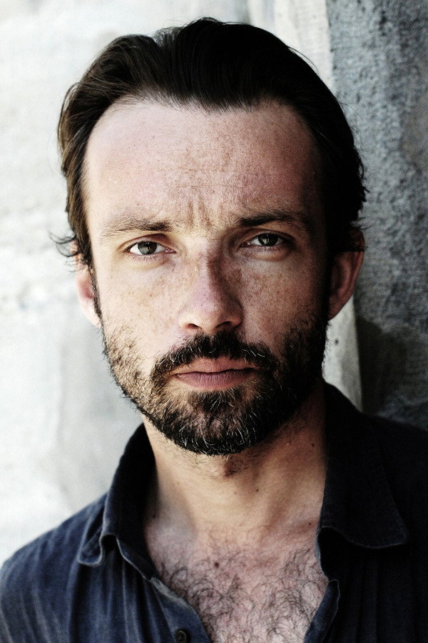 Lucas Gregorowicz's headshot