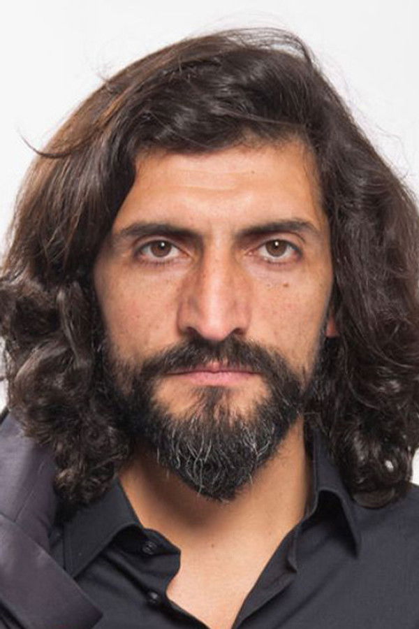 Numan Acar's headshot