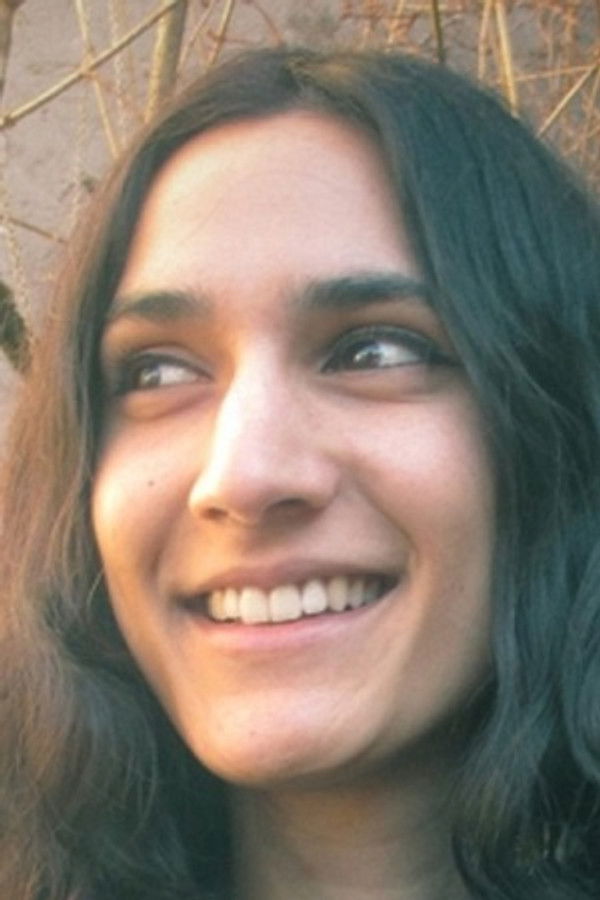 Joma West's headshot