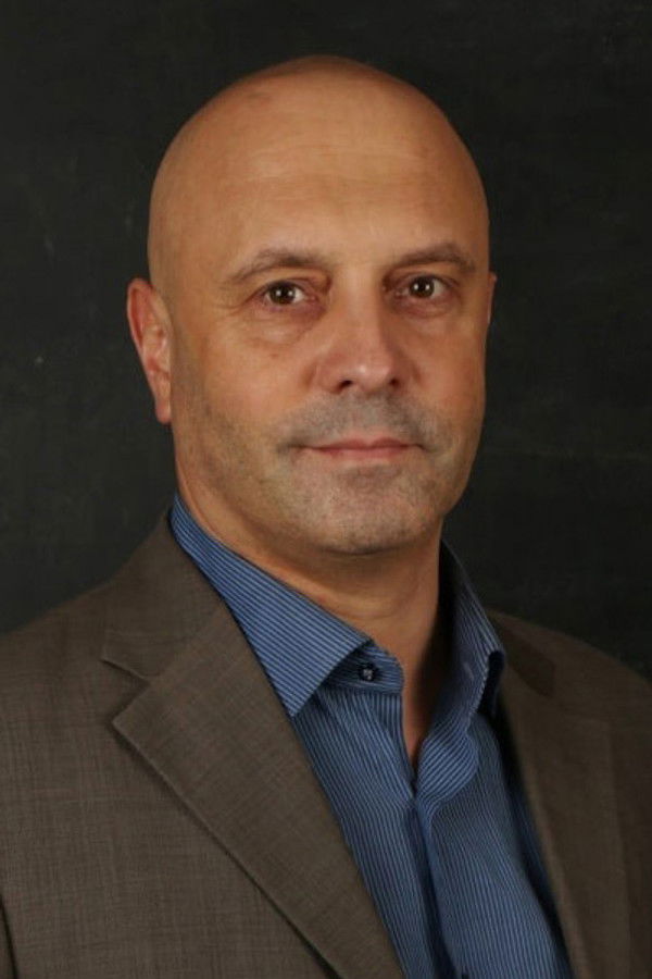 Arkady Sharogradsky's headshot