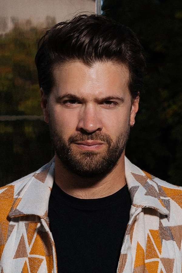 Adam Prendergast's headshot