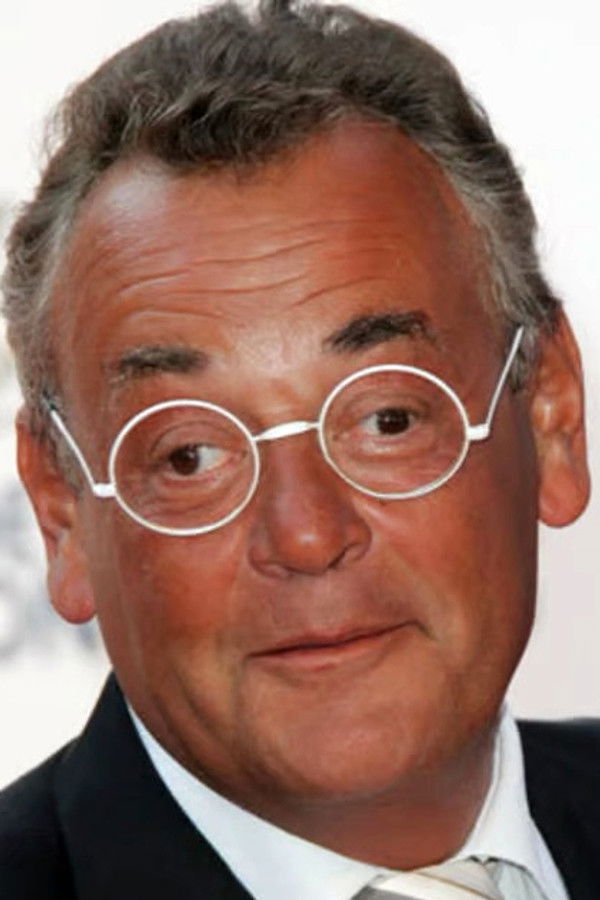 Jean Roucas's headshot