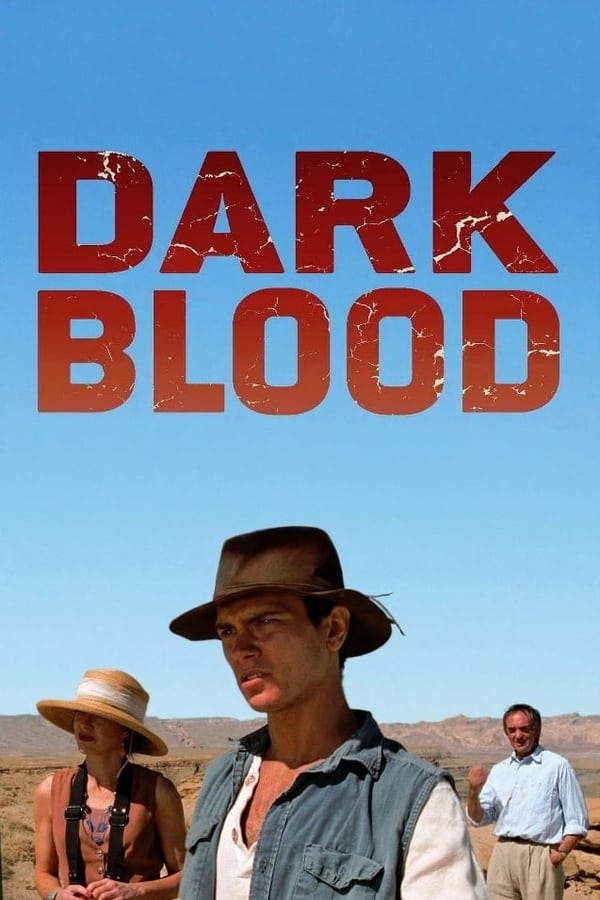 Filmed in 1993 but never completed due to River Phoenix's death, Dark Blood tells the story of Boy, a young widower living on a nuclear testing site in the desert. Boy is waiting for the end of the world and carves Katchina dolls that supposedly contain magical powers. Boy's solitude is interrupted when a Hollywood jet-set couple who are travelling across the desert become stranded after their car breaks down. The couple are rescued by Boy, who then holds them prisoner because of his desire for the woman and his ambition to create a better world with her.