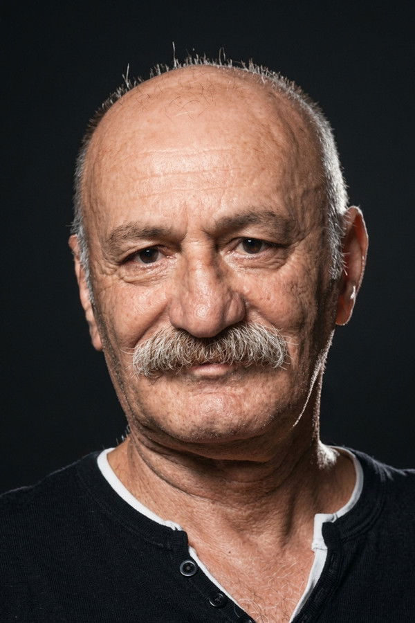 Ali Erkazan's headshot