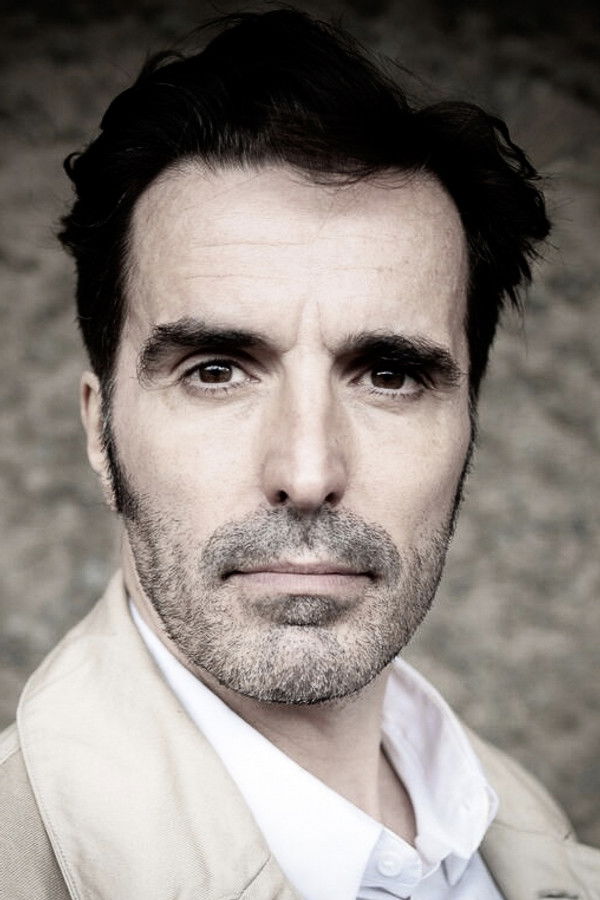 Guy Combes's headshot