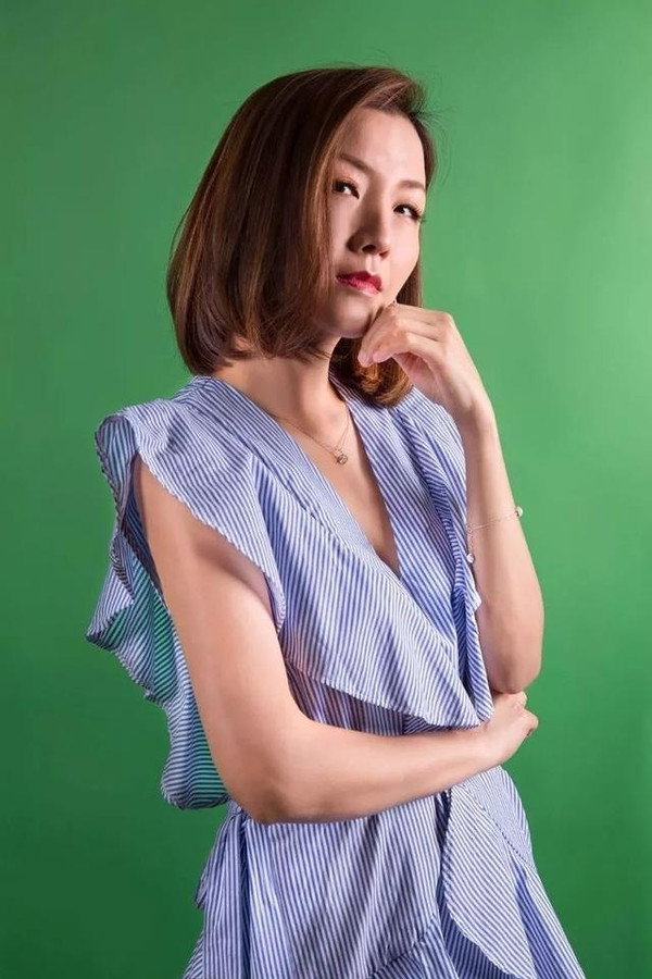 Amy Tam Ka-Chuen's headshot