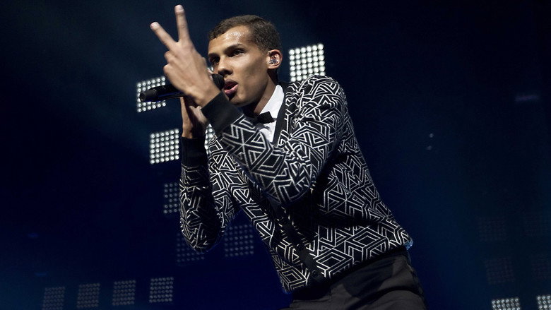 Stromae: Racine carrée Live backdrop 7