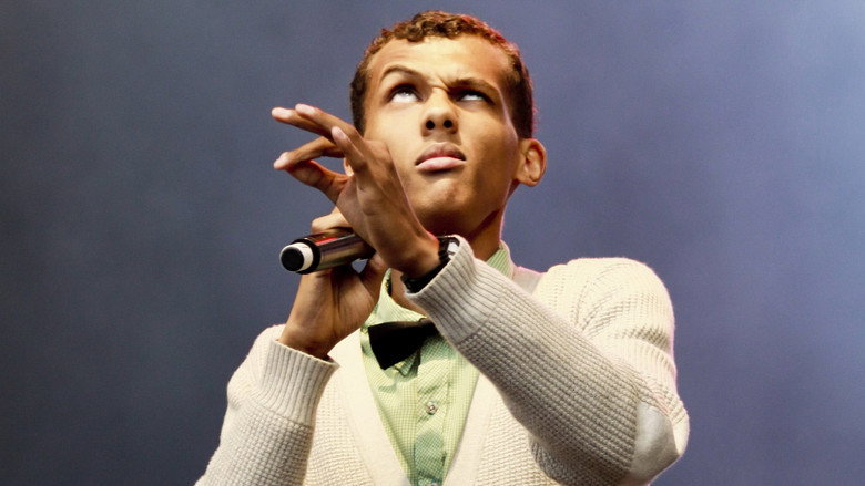 Stromae: Racine carrée Live backdrop 9