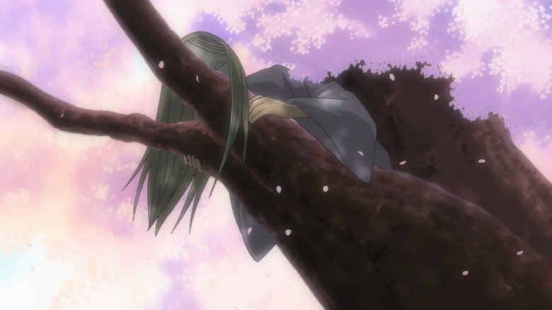 The Man Amidst the Rows of Cherry Trees