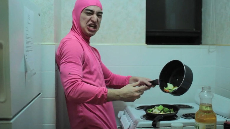 PINK GUY COOKS STIR FRY AND RAPS